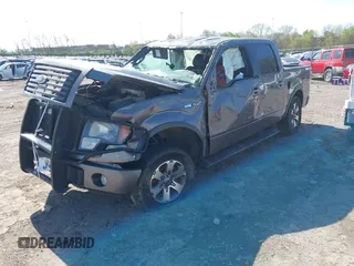 2012 Ford F-150 XL with VIN 1FTFW1EF6CKD30486, listed as a IAAI auction lot 41972362 with 328,321 mi miles. Bid and sale history available at carsss.com. Image 2.