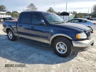 2002 Ford F-150 XLT with VIN 1FTRW07L52KA67609, listed as a Copart auction lot 87720715 with 177,615 mi miles and Salvage Title. Bid and sale history available at carsss.com. Image 4.