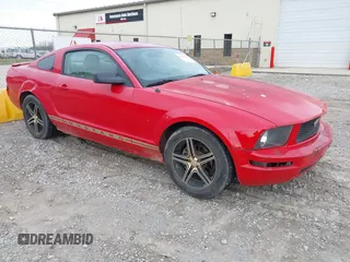2007 Ford Mustang Deluxe z VIN 1ZVFT80N475246636, wystawiony jako IAAI lot #41620976 z przebiegiem 310 653 mil mil oraz . Historia ofert i sprzedaży dostępna na DreamBid. Obrazek 1.