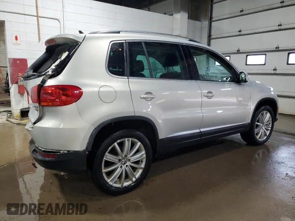 2013 Volkswagen Tiguan SE z VIN WVGBV3AX1DW579506, wystawiony jako Copart lot #52719575 z przebiegiem 163 471 mil mil oraz Szkoda całkowita • Salvage title. Historia ofert i sprzedaży dostępna na DreamBid. Obrazek 3.