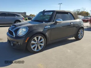 2014 MINI Convertible S with VIN WMWZP3C58ET706941, listed as a Copart auction lot 81900674 with 61,292 mi miles and Salvage Title. Bid and sale history available at DreamBid. Image 1.