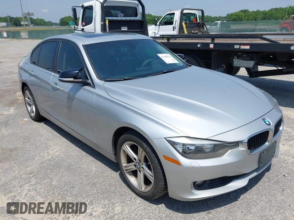 2013 BMW 3 Series 328i xDrive with VIN WBA3B3C52DJ975970, listed as a IAAI auction lot 42280624 with 2,262,225 mi miles and . Bid and sale history available at DreamBid. Image 1.