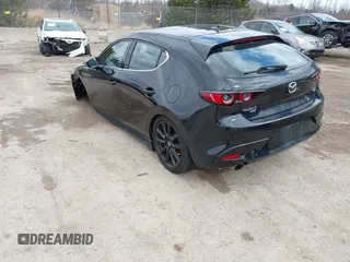 2021 Mazda 3 2.5 Turbo with VIN JM1BPBJY0M1344335, listed as a IAAI auction lot 42008145 with 71,452 mi miles and . Bid and sale history available at DreamBid. Image 3.