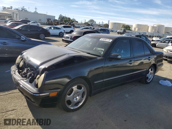 2001 Mercedes-Benz E-Class with VIN WDBJF70JX1B327997, listed as a Copart auction lot 87650175 with 268,045 mi miles and Salvage Title. Bid and sale history available at carsss.com. Image 1.
