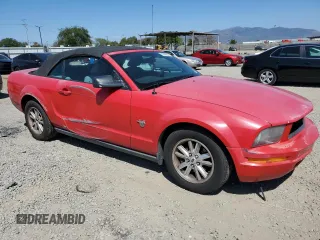 2009 Ford Mustang with VIN 1ZVHT84N895112458, listed as a Copart auction lot 52880595 with 166,456 mi miles and Salvage title. Bid and sale history available at DreamBid. Image 4.