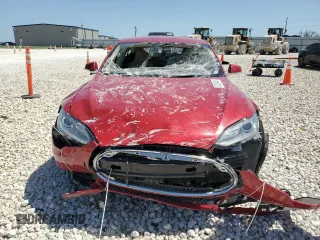 2013 Tesla Model S with VIN 5YJSA1CN1DFP26864, listed as a Copart auction lot 52029485 with 63,260 mi miles and Salvage Title. Bid and sale history available at DreamBid. Image 5.