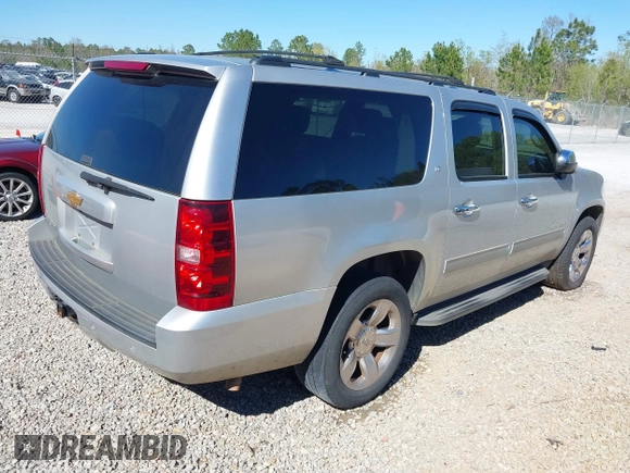 2014 Chevrolet Suburban LT with VIN 1GNSCJE06ER105294, listed as a IAAI auction lot 41687882 with 200,698 mi miles. Bid and sale history available at carsss.com. Image 4.