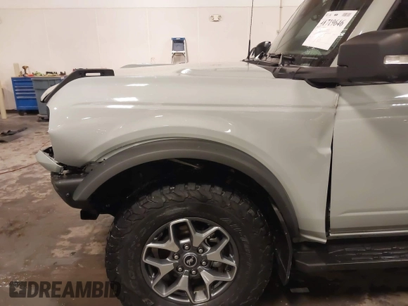 2021 Ford Bronco z VIN 1FMEE5DP0MLA64549, wystawiony jako IAAI lot #41719646 z przebiegiem 33 089 mil mil oraz . Historia ofert i sprzedaży dostępna na DreamBid. Obrazek 17.
