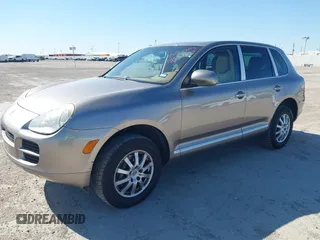 2005 Porsche Cayenne with VIN WP1AA29P75LA24751, listed as a IAAI auction lot 41837622 with 138,912 mi miles. Bid and sale history available at carsss.com. Image 2.