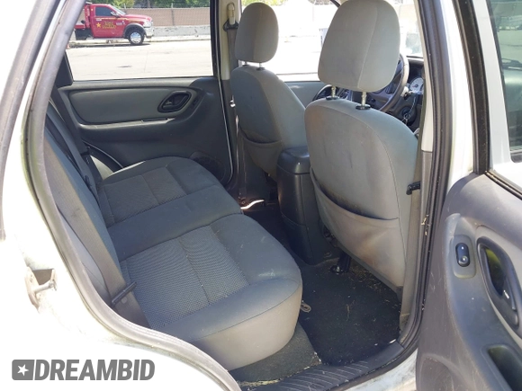 2006 Ford Escape XLT with VIN 1FMCU03166KC27627, listed as a IAAI auction lot 42317217 with 167,738 mi miles and . Bid and sale history available at DreamBid. Image 8.