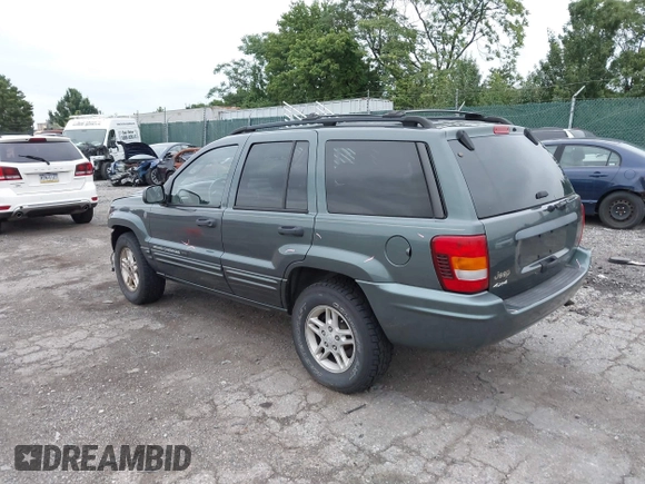 2004 Jeep Grand Cherokee Laredo with VIN 1J4GW48S24C276284, listed as a IAAI auction lot 42596655 with 142,524 mi miles and . Bid and sale history available at DreamBid. Image 3.