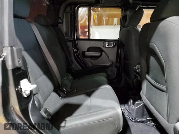 2021 Jeep Gladiator Willys with VIN 1C6HJTAG4ML556255, listed as a Copart auction lot 57143125 with 57,104 mi miles and Salvage title. Bid and sale history available at DreamBid. Image 10.