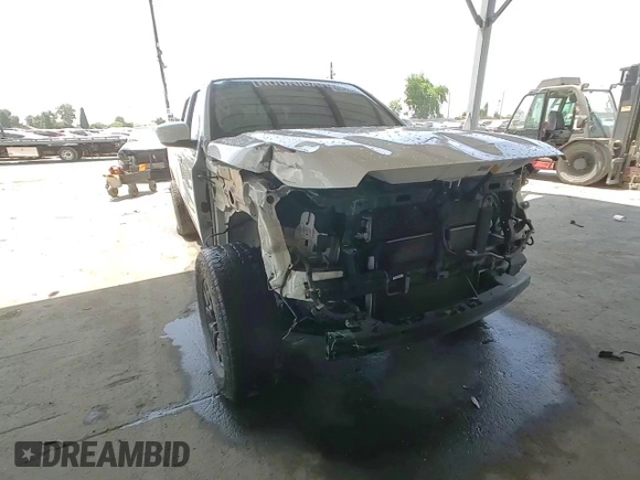 2022 Nissan Frontier SV with VIN 1N6ED1EJ6NN617301, listed as a Copart auction lot 60572395 with 77,269 mi miles and Salvage title. Bid and sale history available at DreamBid. Image 14.