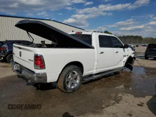 2018 Ram 1500 Outdoorsman with VIN 1C6RR7TT4JS177868, listed as a Copart auction lot 50699295 with 124,974 mi miles and Salvage title. Bid and sale history available at DreamBid. Image 3.