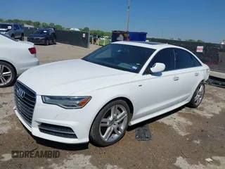2016 Audi A6 2.0T Premium Plus with VIN WAUGFAFC4GN045229, listed as a IAAI auction lot 41974532 with 122,585 mi miles. Bid and sale history available at carsss.com. Image 17.