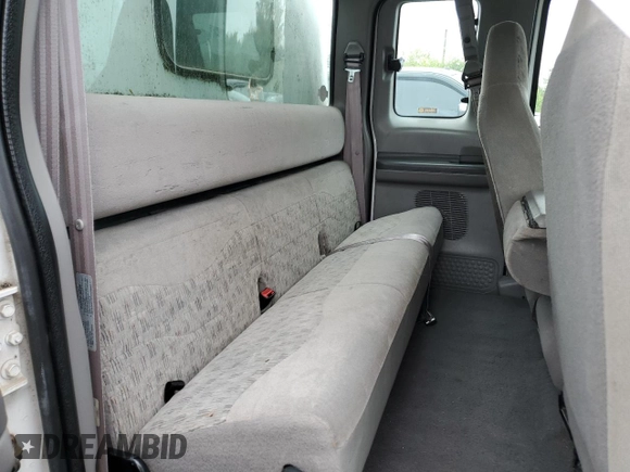 1999 Ford F-250 XL with VIN 1FTNX20L3XEA81807, listed as a Copart auction lot 58036385 with 251,614 mi miles and Salvage title. Bid and sale history available at DreamBid. Image 10.
