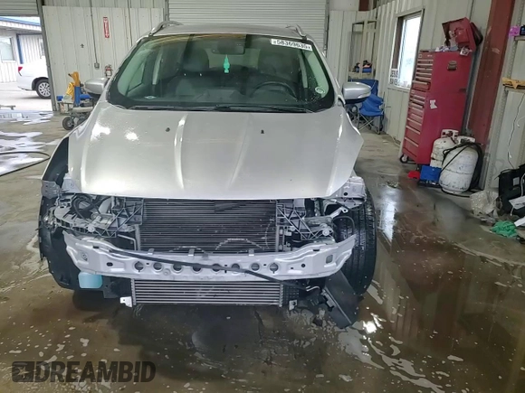 2014 Ford Escape Titanium с VIN 1FMCU0J98EUA35069, выставлен на аукционе Copart как лот 58369635 с пробегом 92 323 миль миль и Списание • Salvage title. История ставок и продаж доступна на DreamBid. Изображение 15.