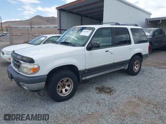 2000 Ford Explorer XLT z VIN 1FMDU73E6YZB38828, wystawiony jako IAAI lot #42458837 z przebiegiem 190 053 mil mil oraz . Historia ofert i sprzedaży dostępna na DreamBid. Obrazek 2.