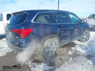 2016 Honda Pilot EX-L with VIN 5FNYF6H56GB065502, listed as a IAAI auction lot 41617799 with 144,397 mi miles. Bid and sale history available at carsss.com. Image 4.