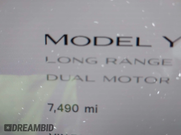 2024 Tesla Model Y Long Range with VIN 7SAYGDEE5RA241433, listed as a IAAI auction lot 41569277 with 7,490 mi miles. Bid and sale history available at carsss.com. Image 14.