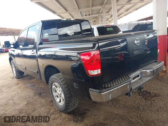 2006 Nissan Titan LE z VIN 1N6AA07B86N558017, wystawiony jako IAAI lot #42179803 z przebiegiem 185 367 mil mil oraz . Historia ofert i sprzedaży dostępna na DreamBid. Obrazek 3.