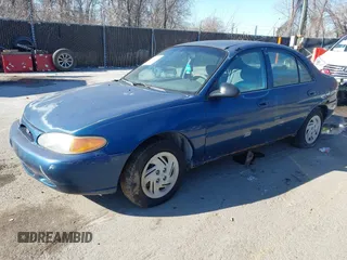 1998 Ford Escort SE with VIN 1FAFP13P4WW288248, listed as a IAAI auction lot 41456179 with 223,155 mi miles. Bid and sale history available at carsss.com. Image 2.