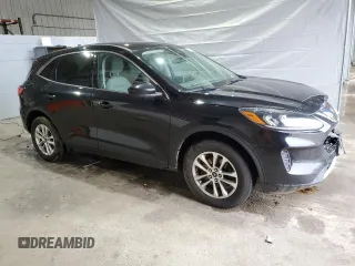 2020 Ford Escape SE with VIN 1FMCU9G61LUB27963, listed as a Copart auction lot 55820095 with 82,264 mi miles and Salvage title. Bid and sale history available at DreamBid. Image 4.