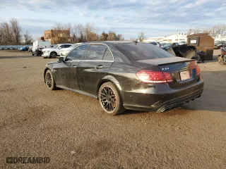 2014 Mercedes-Benz E-Class E 63 AMG S-Model with VIN WDDHF7GB4EA955991, listed as a Copart auction lot 48908265 with 76,602 mi miles and Salvage Title. Bid and sale history available at carsss.com. Image 2.