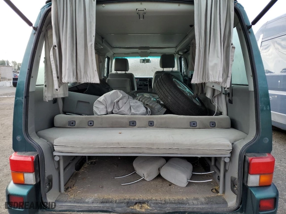 2002 Volkswagen EuroVan MV with VIN WV2NB47092H095600, listed as a Copart auction lot 50705065 with 223,049 mi miles and Clean Title. Bid and sale history available at carsss.com. Image 10.