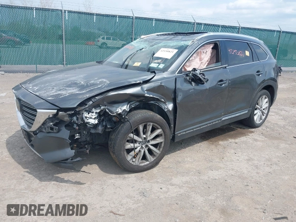 2016 Mazda CX-9 Grand Touring with VIN JM3TCBDY3G0117802, listed as a IAAI auction lot 42150821 with 157,760 mi miles and . Bid and sale history available at DreamBid. Image 17.