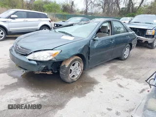 2002 Toyota Camry XLE z VIN 4T1BF32K02U522335, wystawiony jako IAAI lot #42037459 z przebiegiem 214 832 mil mil oraz . Historia ofert i sprzedaży dostępna na DreamBid. Obrazek 2.