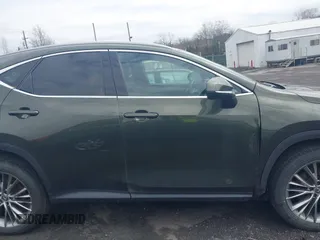 2023 Lexus NX 350h Premium with VIN 2T2GKCEZ5PC014862, listed as a IAAI auction lot 41999437 with 45,853 mi miles and . Bid and sale history available at DreamBid. Image 13.