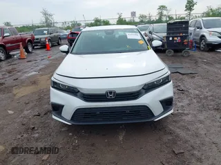 2024 Honda Civic LX z VIN 2HGFE2F20RH523593, wystawiony jako IAAI lot #42213468 z przebiegiem 13 561 mil mil oraz . Historia ofert i sprzedaży dostępna na DreamBid. Obrazek 12.