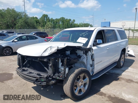 2020 Chevrolet Suburban Premier with VIN 1GNSCJKC9LR125292, listed as a IAAI auction lot 42073858 with 92,363 mi miles and . Bid and sale history available at DreamBid. Image 6.