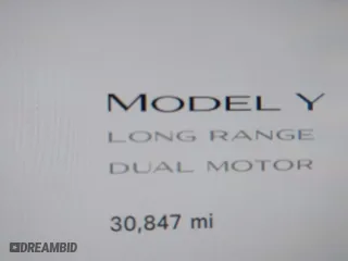 2023 Tesla Model Y Long Range with VIN 7SAYGDEE8PA140562, listed as a IAAI auction lot 41837231 with 30,847 mi miles. Bid and sale history available at carsss.com. Image 16.