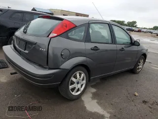 2005 Ford Focus S with VIN 3FAFP37N75R120187, listed as a Copart auction lot 57390605 with 163,547 mi miles and Salvage title. Bid and sale history available at DreamBid. Image 3.