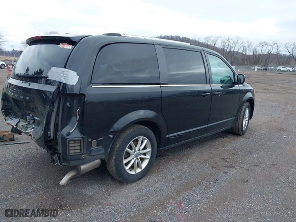 2019 Dodge Grand Caravan SXT with VIN 2C4RDGCG0KR692444, listed as a IAAI auction lot 41811224 with 102,179 mi miles. Bid and sale history available at carsss.com. Image 4.