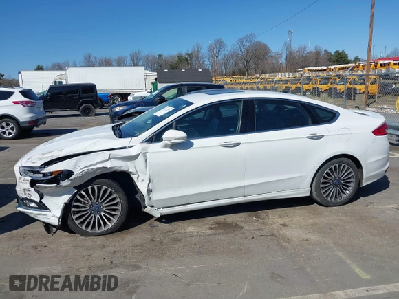 2018 Ford Fusion Titanium with VIN 3FA6P0D93JR162212, listed as a IAAI auction lot 41767723 with 134,010 mi miles and . Bid and sale history available at DreamBid. Image 14.