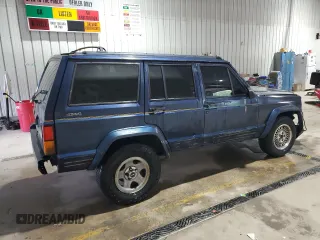 1995 Jeep Cherokee z VIN 1J4FN78S7SL537213, wystawiony jako Copart lot #58700105 z przebiegiem 261 606 mil mil oraz Szkoda całkowita • Salvage title. Historia ofert i sprzedaży dostępna na DreamBid. Obrazek 3.