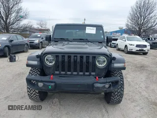 2022 Jeep Gladiator Rubicon with VIN 1C6JJTBG7NL145501, listed as a IAAI auction lot 41506842 with 20,593 mi miles and . Bid and sale history available at DreamBid. Image 12.