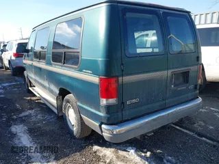 1999 Ford Econoline Cargo with VIN 1FDRE14W3XHB36482, listed as a IAAI auction lot 41393346 with 130,669 mi miles. Bid and sale history available at carsss.com. Image 3.