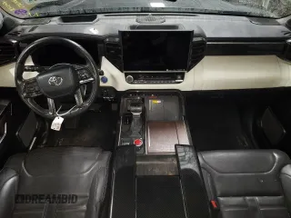 2023 Toyota Tundra Capstone Hybrid with VIN 5TFVC5DB9PX027611, listed as a Copart auction lot 85657804 with 58,052 mi miles and Salvage title. Bid and sale history available at DreamBid. Image 8.