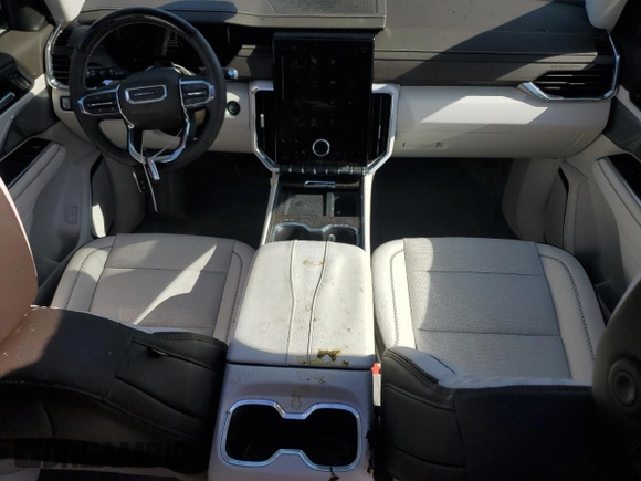 2025 GMC Acadia FWD Denali z VIN 1GKENLRS6SJ134283, wystawiony jako Copart lot #52081235 z przebiegiem 6 382 mil mil oraz Nie do naprawy • Non repairable. Historia ofert i sprzedaży dostępna na DreamBid. Obrazek 8.
