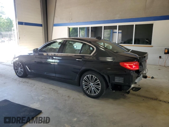 2018 BMW 5 Series 540i xDrive with VIN WBAJE7C56JWC57314, listed as a Copart auction lot 60610715 with 73,015 mi miles and Salvage title. Bid and sale history available at DreamBid. Image 2.