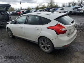 2013 Ford Focus SE with VIN 1FADP3K20DL118007, listed as a Copart auction lot 52184605 with 153,033 mi miles and Salvage Title. Bid and sale history available at DreamBid. Image 2.