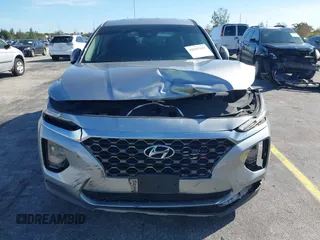 2020 Hyundai Santa Fe SEL with VIN 5NMS3CAD5LH218667, listed as a IAAI auction lot 41025347 with 81,632 mi miles and . Bid and sale history available at DreamBid. Image 6.