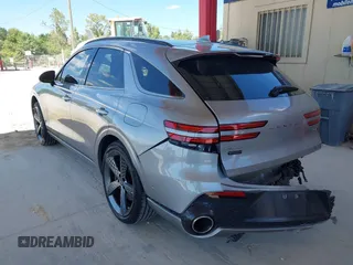 2023 Genesis GV70 Sport with VIN KMUMCDTC4PU098990, listed as a IAAI auction lot 42039386 with 32,090 mi miles and . Bid and sale history available at DreamBid. Image 3.