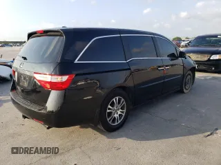 2013 Honda Odyssey EX-L with VIN 5FNRL5H66DB023651, listed as a Copart auction lot 48676274 with 164,687 mi miles and Salvage Title. Bid and sale history available at DreamBid. Image 3.