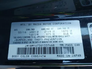 2016 Mazda 3 i Sport with VIN JM1BM1U73G1337468, listed as a IAAI auction lot 41824105 with 96,959 mi miles. Bid and sale history available at carsss.com. Image 9.