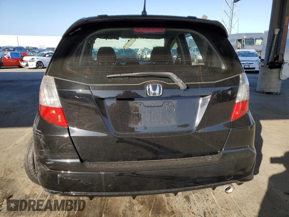 2010 Honda Fit Sport with VIN JHMGE8H46AS027813, listed as a Copart auction lot 52589035 with 212,672 mi miles and Salvage Title. Bid and sale history available at carsss.com. Image 6.
